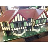 Tri-ang Toys, large painted wood Vintage Dolls House of break front form, the front with two opening