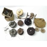 Nine assorted fishing reels including vintage Australian Billy Lee "Lixall" side cast, Brass and Oak