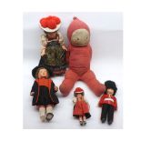 A collection of assorted vintage dolls to include celluloid costume dolls, together with a child's