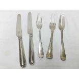 A small group of mixed flatwares including two Old English pattern Dessert Forks, London 1838, a