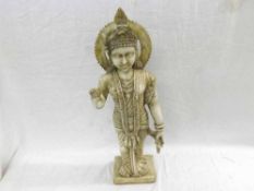 An Oriental Carved Hardstone/Alabaster Figure depicting a standing deity wearing traditional head-