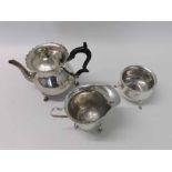 Early 20th Century matched three-piece tea set of circular baluster form, each items supported on