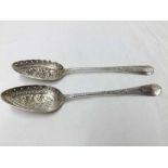 A matched pair of George III Berry Table Spoons (later embossed), each bearing an heraldic crest