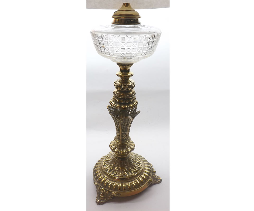A decorative Brass Based Oil Lamp with clear glass facetted font, 20" high   70-90