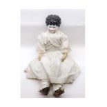 A Painted Porcelain Head and Shoulder Plate Doll, with cloth body, kid leather lower arms, height