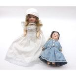 Two Armand Marseille Dolls, each with fixed glass eyes, painted lashes, open mouth showing upper