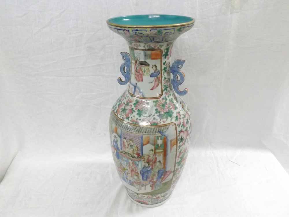 A Famille Rose Large Baluster Vase, the neck applied with animalistic handles and the body decorated