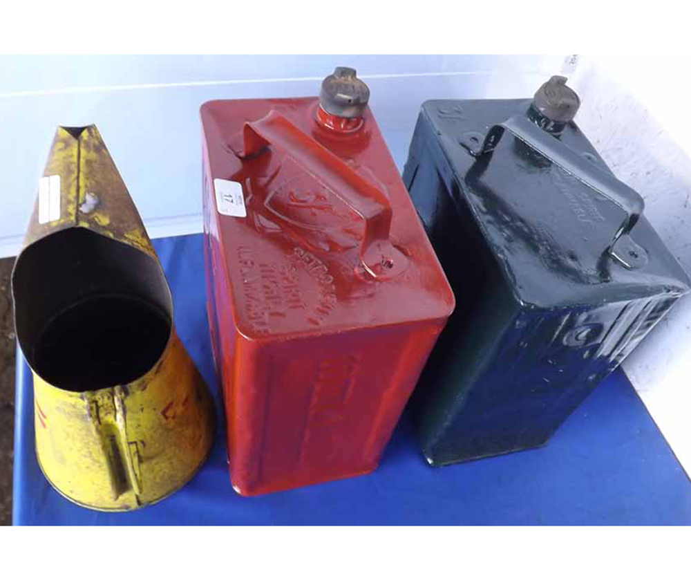 A TWO-GALLON ESSO FUEL CAN, WITH CAP, A TWO-GALLON SHELL FUEL CAN WITH CAPS AND A FURTHER OIL CAN