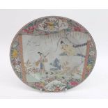 An 18th Century Chinese Circular Plate, painted in colours with scene of young lady in a garden