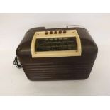 Mid-20th Century brown Bakelite Bush radio DAC 10, serial number 62/81379, 12” x 9”