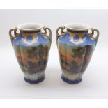 A pair of Noritake Baluster Vases of two handled fluted tapering Baluster form painted in colours