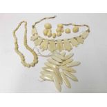 A quantity of Ethnic Bone jewellery including fringe necklace and similar bracelet, bead necklace