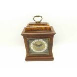 A late 20th Century Walnut and Mahogany cased timepiece, Elliott, the caddy topped case with