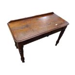 A Victorian Mahogany Two Drawer Side Table, raised on turned legs, 42” wide