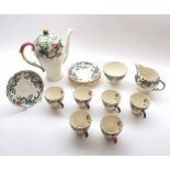 A Royal Cauldon floral decorated Coffee Set comprising: Coffee Pot, Sugar Basin, Cream Jug, six Cups