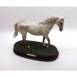 Royal Doulton model “Desert Orchid” on a plush lined stand, 7 ½” high