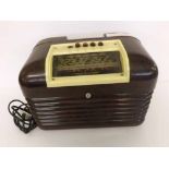 Mid-20th Century Bush brown Bakelite radio, type DAC 10, serial number 62/45429, 13” x 9”