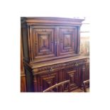A 19th Century Flemish Walnut Two-Piece Side Cabinet, top section with moulded cornice, pillared