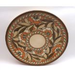 A Crown Ducal Charlotte Rhead Charger, decorated with abstract floral design, Rhead signature to