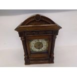 An early 20th Century Walnut Cased Triple Barrel Mantel Clock, Junghans, the architectural case with