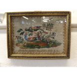 A small 19th Century rectangular Tapestry Panel, decorated with scene of two birds amongst foliage