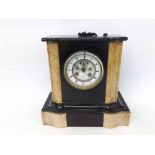 A late 19th Century black and yellow variegated Marble Mantel Clock, the plinth shaped case with