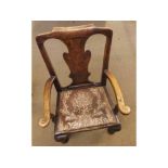 A Georgian Oak and Elm Splat Back Carver Chair, raised on front cabriole legs, 25 ½” wide