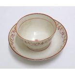 18th Century English Tea Bowl and Saucer decorated predominantly in iron red, base marked with an