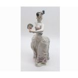 20th Century Meissen figure of a Dancer in Art Deco style dress, raised on a plinth base, blue