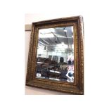 Rectangular bevelled Wall Mirror in heavy gilt frame, 23” high