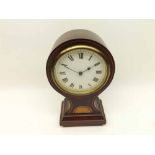 An early 20th Century Mahogany and Boxwood lined inlaid Mantel timepiece, the balloon shaped case