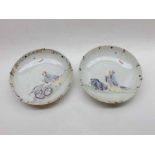 A pair of 18th Century Chinese Bowls of circular form, the centres painted in colours with scenes of