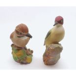 Two Royal Worcester bird ornaments, “Jay” No 3248 and “Woodpecker” No 3249, largest 7” high (2)