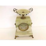 An early 20th Century French Green Alabaster Mantel Clock, the plinth-shaped case surmounted by a