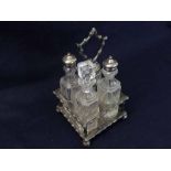 A 19th Century Silver Plated Four Bottle Cruet, the stand with bamboo type detail, 10” high