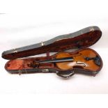 An early 20th Century Violin, two piece back with single purfling, together with bow, in a plush-