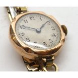 A second quarter of 20th Century 9ct Gold Ladies dress watch, Swiss jewelled movement to a signed