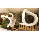 Pair of contemporary composition planters formed as wicker baskets with floral decoration, approx