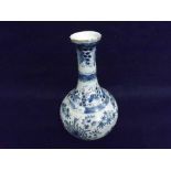 A Delft Baluster Vase decorated throughout in underglaze blue with foliage etc, (extensive repair,