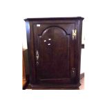 19th Century Oak corner cabinet, single door with arched detail and Brass hinges and escutcheon, 30”