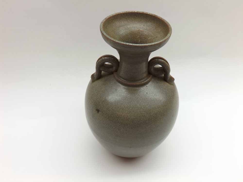 Chinese double handled cylinder Vase with flared lip, decorated with a crackle glaze, 7 ¼” high