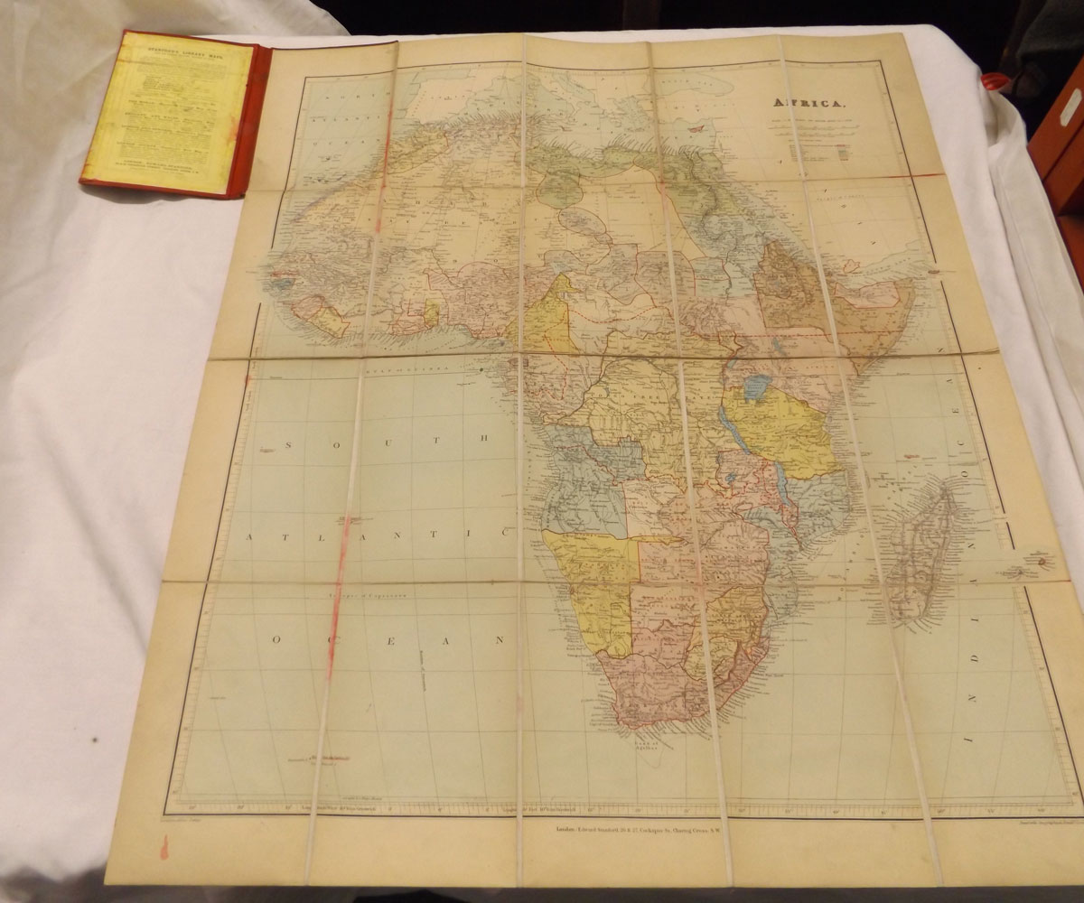 E STANFORD: MAP OF AFRICA, col'd map circa 1901, fdg bkd onto linen, orig cl worn,