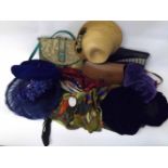 A box containing various Ladies vintage accessories to include hats, scarves, handbags etc