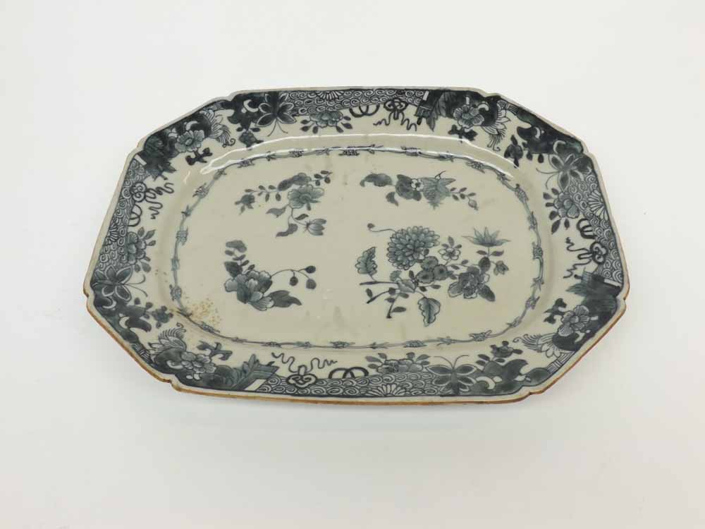 A Nanking canted rectangular Dish, unusually painted in black and sprays of foliage within a