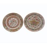 A pair of Chinese Circular Plates, the centres each painted predominantly in famille verte and