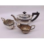 A George V Three Piece Bachelors Tea Set of fluted shaped oval form, comprising Teapot, Two-