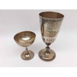 A Victorian Goblet of inverted bell form to a knopped stem and spreading circular foot, engraved