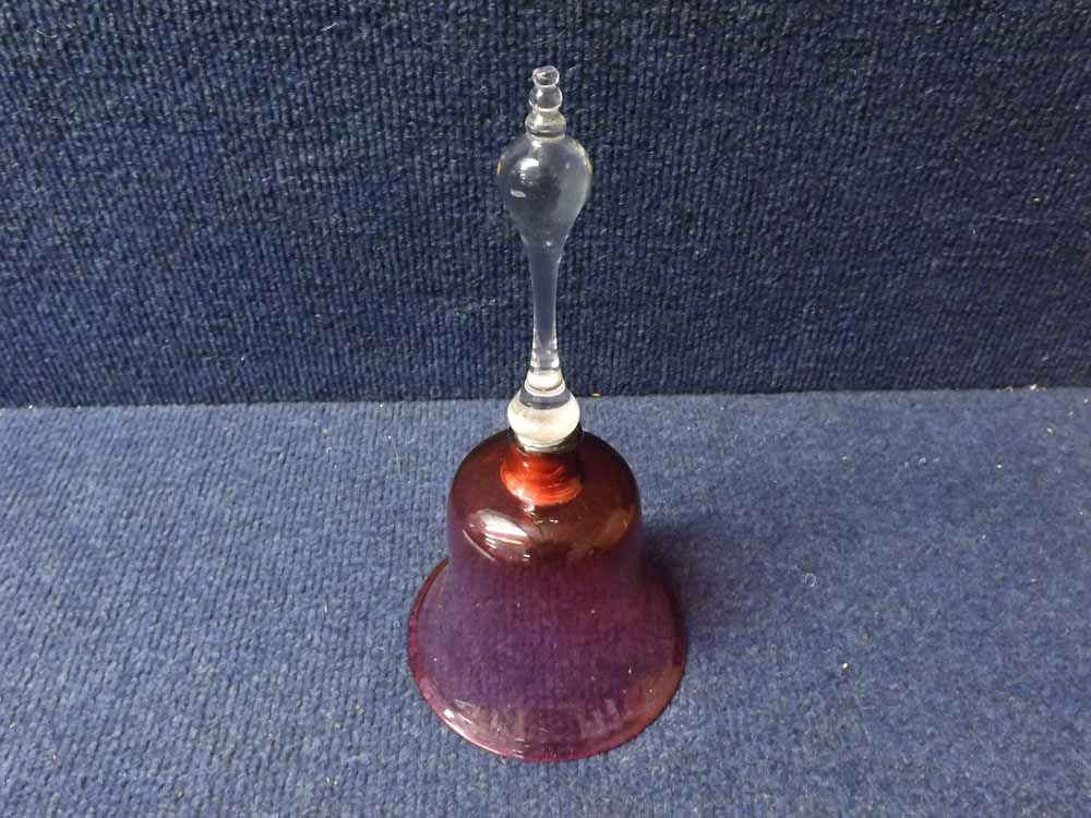 A 19th Century Cranberry and Clear Glass Bell of typical form lacking central clanger, 9" high