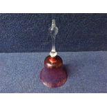 A 19th Century Cranberry and Clear Glass Bell of typical form lacking central clanger, 9" high