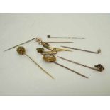 Group of eight assorted Victorian/early 20th Century Stick Pins with decorative finials including